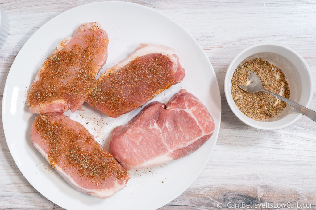 Covering Pork Chops with spices