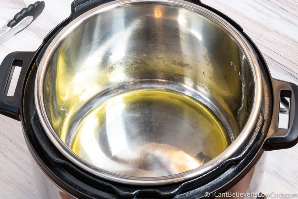 Instant Pot with olive oil in it