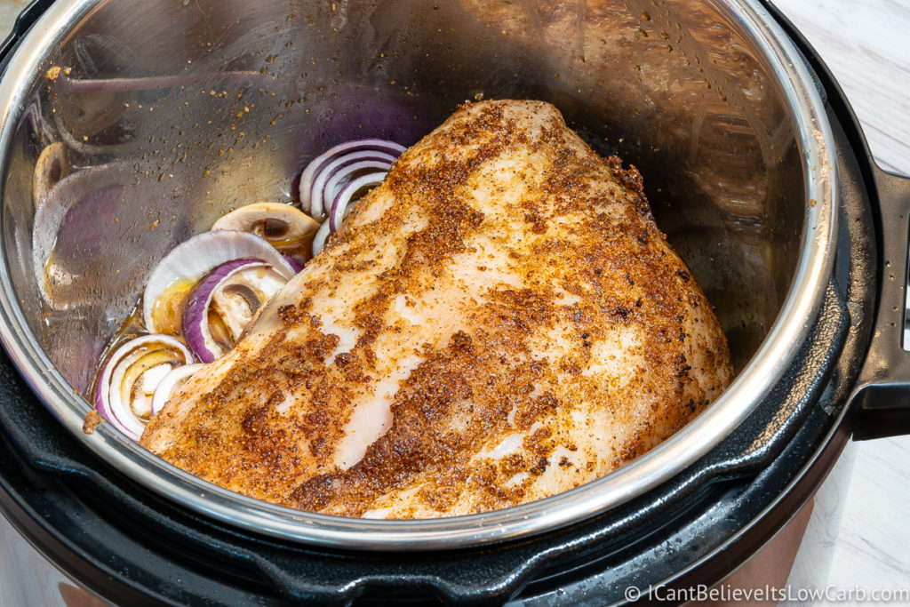 Adding the Pork Loin back to the instant pot with veggies