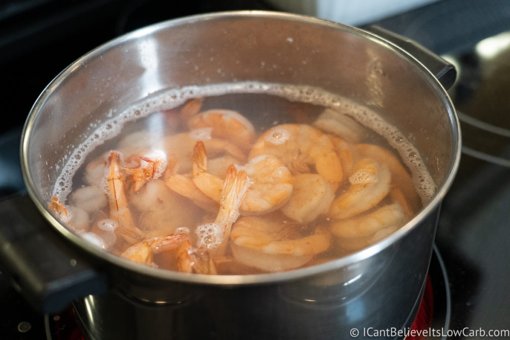 Cooking shrimp in a pot of boiling water