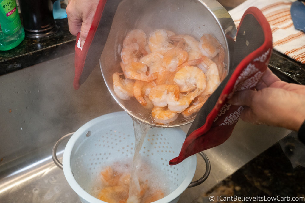 draining the shrimp in a colander
