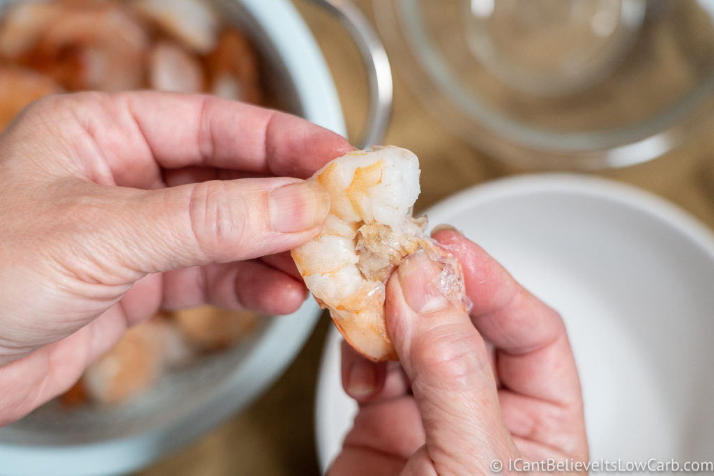 peeling cooked shrimp