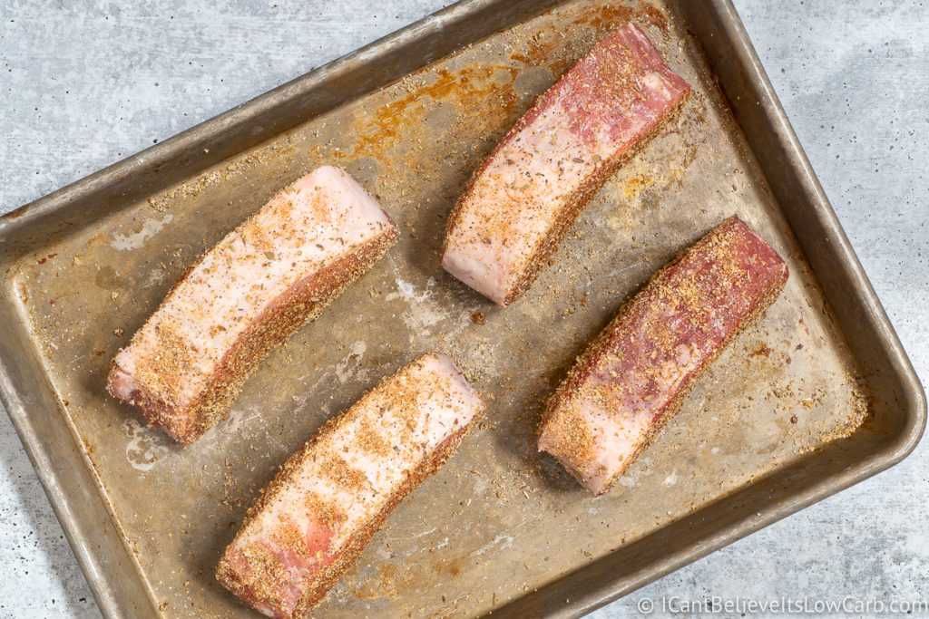 Seasoning Pork Chops on all sides