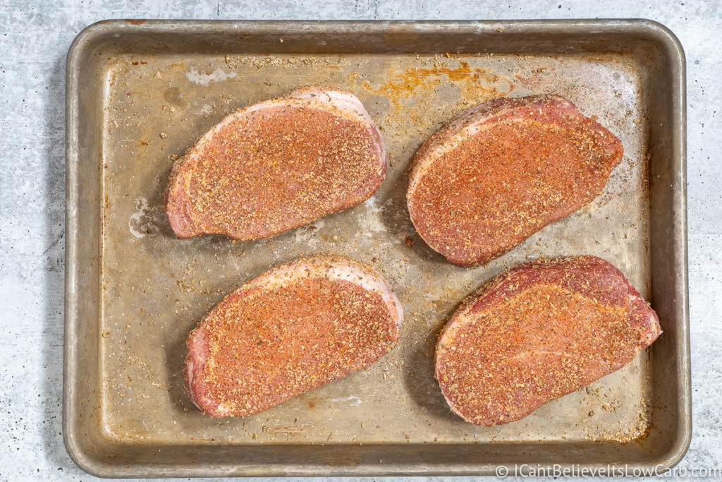 Seasoning Pork Chops before baking them in the oven