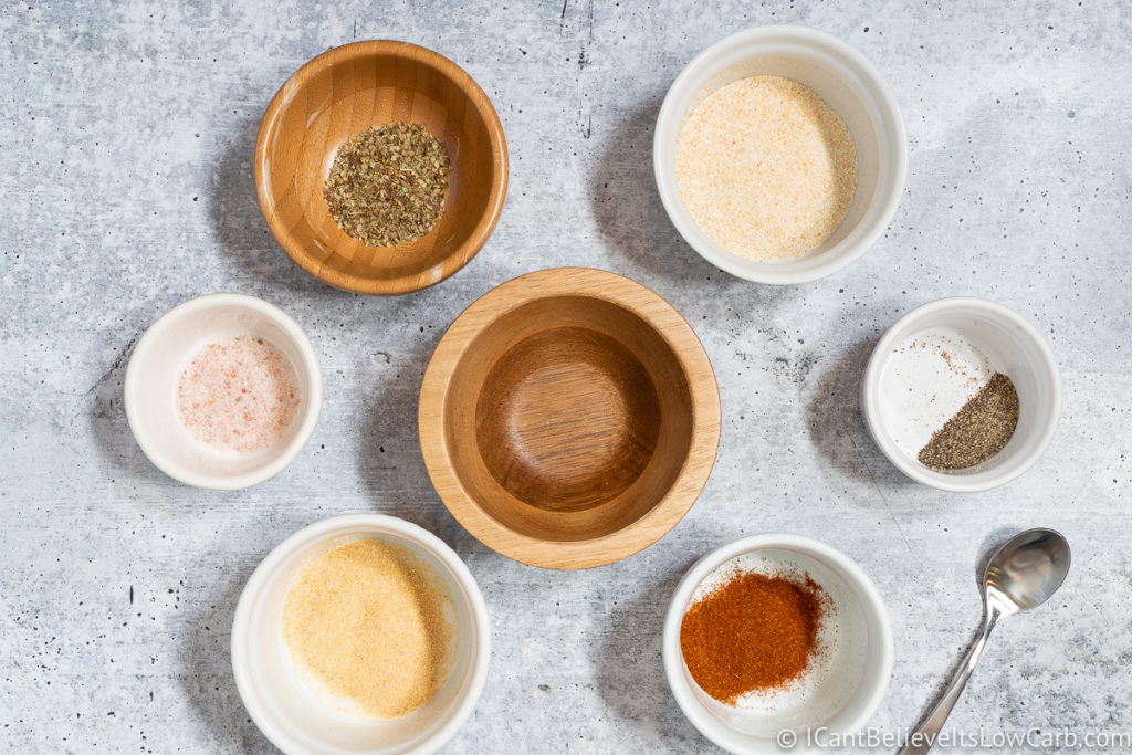 seasonings in small bowls for Baked Pork Chops