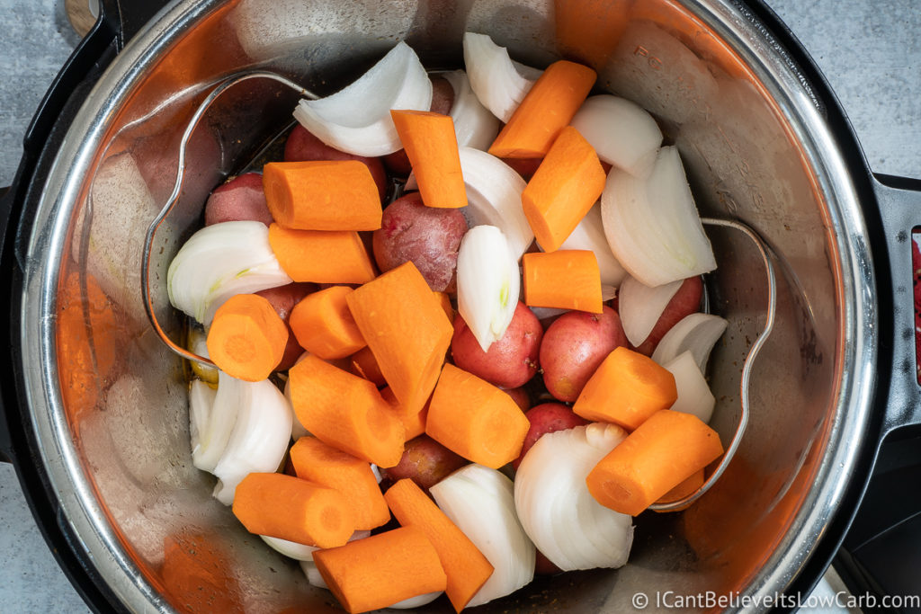 adding carrots to the Instant Pot