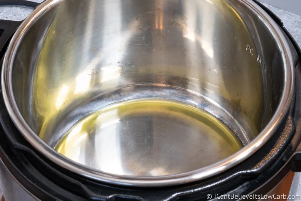 Adding olive oil to the Instant Pot