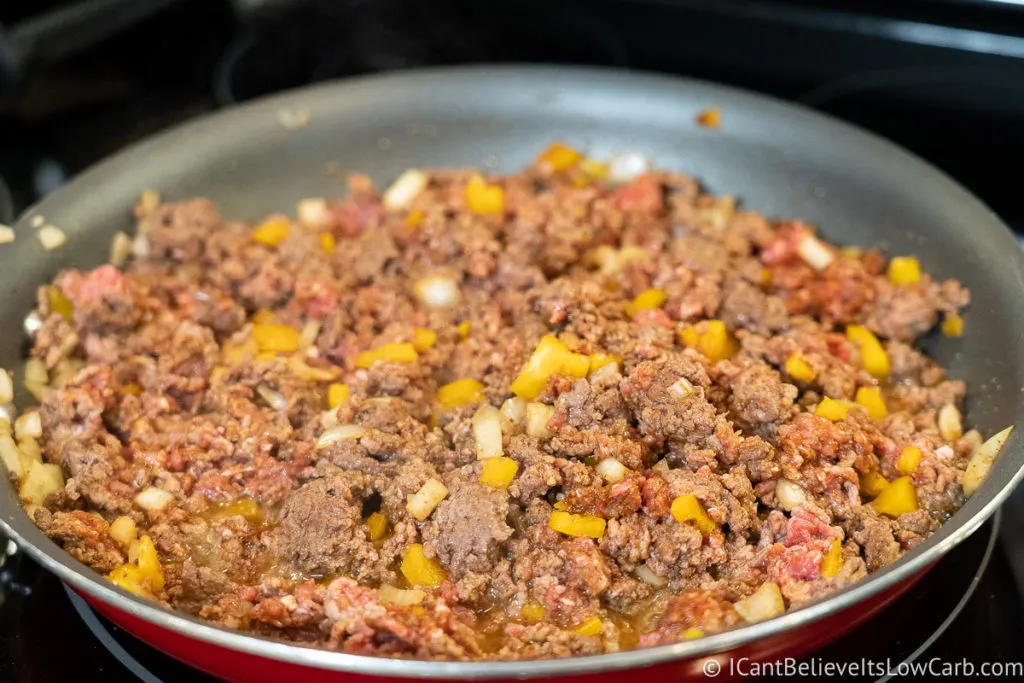 Cooking Keto Taco Casserole meat on the stove