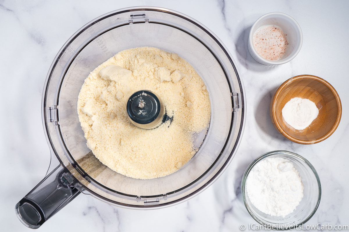 Adding almond flour to food processor