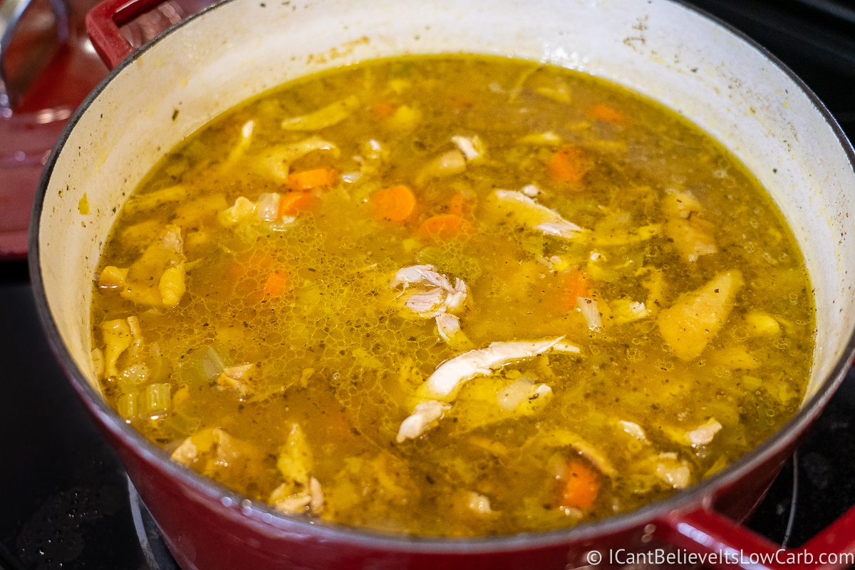 Cooking Keto Chicken Noodle Soup on the stove