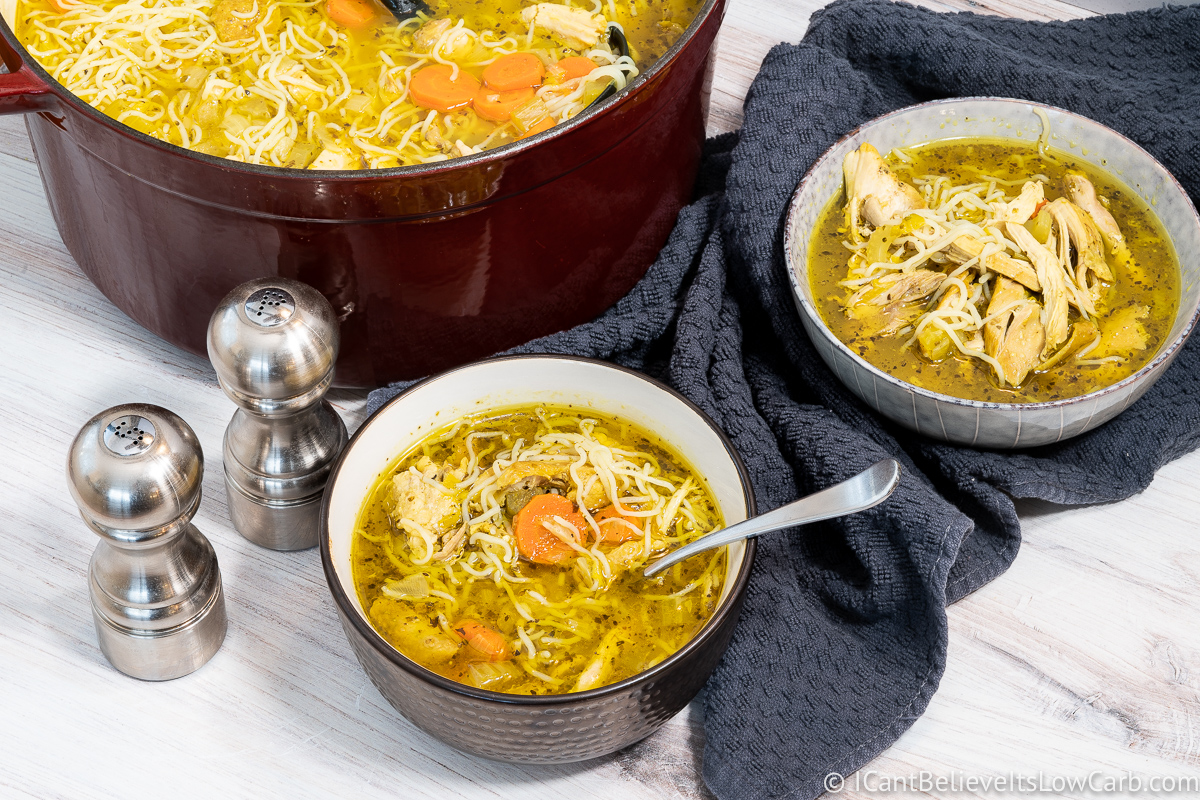 Keto Chicken Noodle Soup in bowls with a spoon