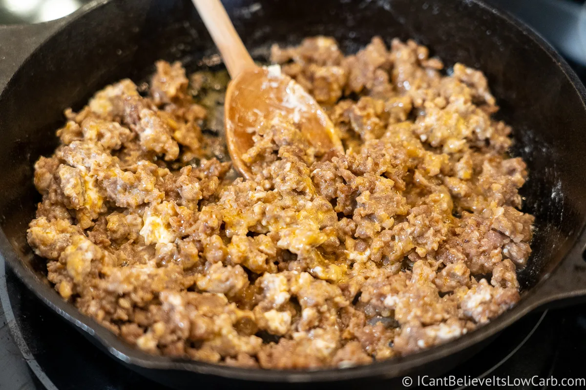 mixing sausage gravy ingredients